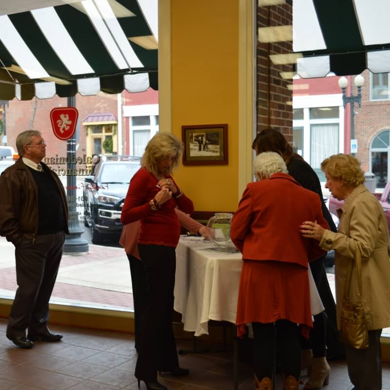Signing in at the December Chamber Coffee