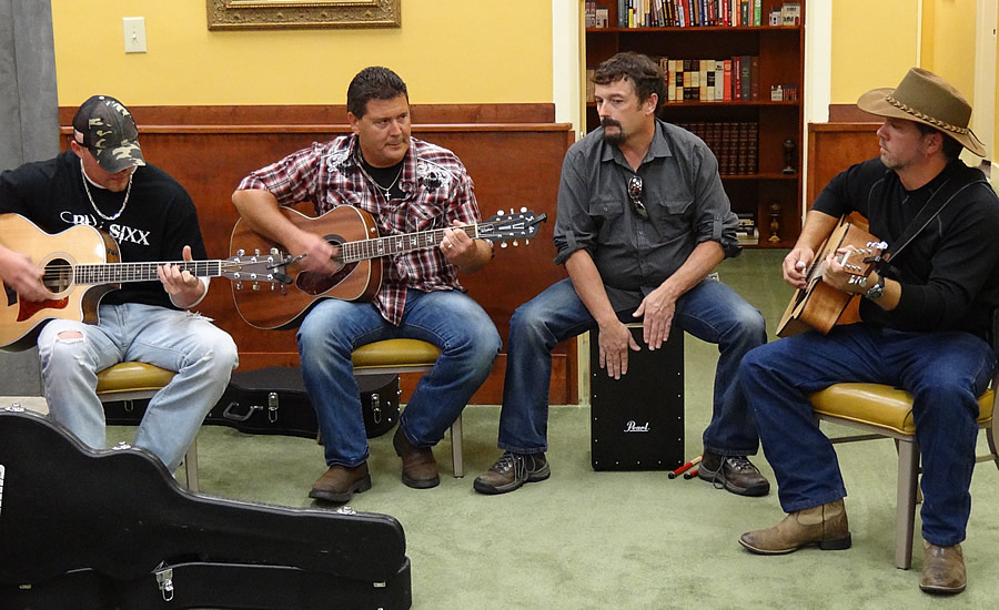 Buck Sixx plays during Main Street Columbia's Uncorked